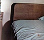 Headboard of bed in east (master) bedroom, where "PIG" was written in Colette MacDonald's blood