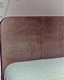 Headboard of bed in east bedroom