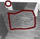 Blood stains on floor and red-brown stains on south door frame in dining room leading to kitchen of 544 Castle Drive (circled by investigators)